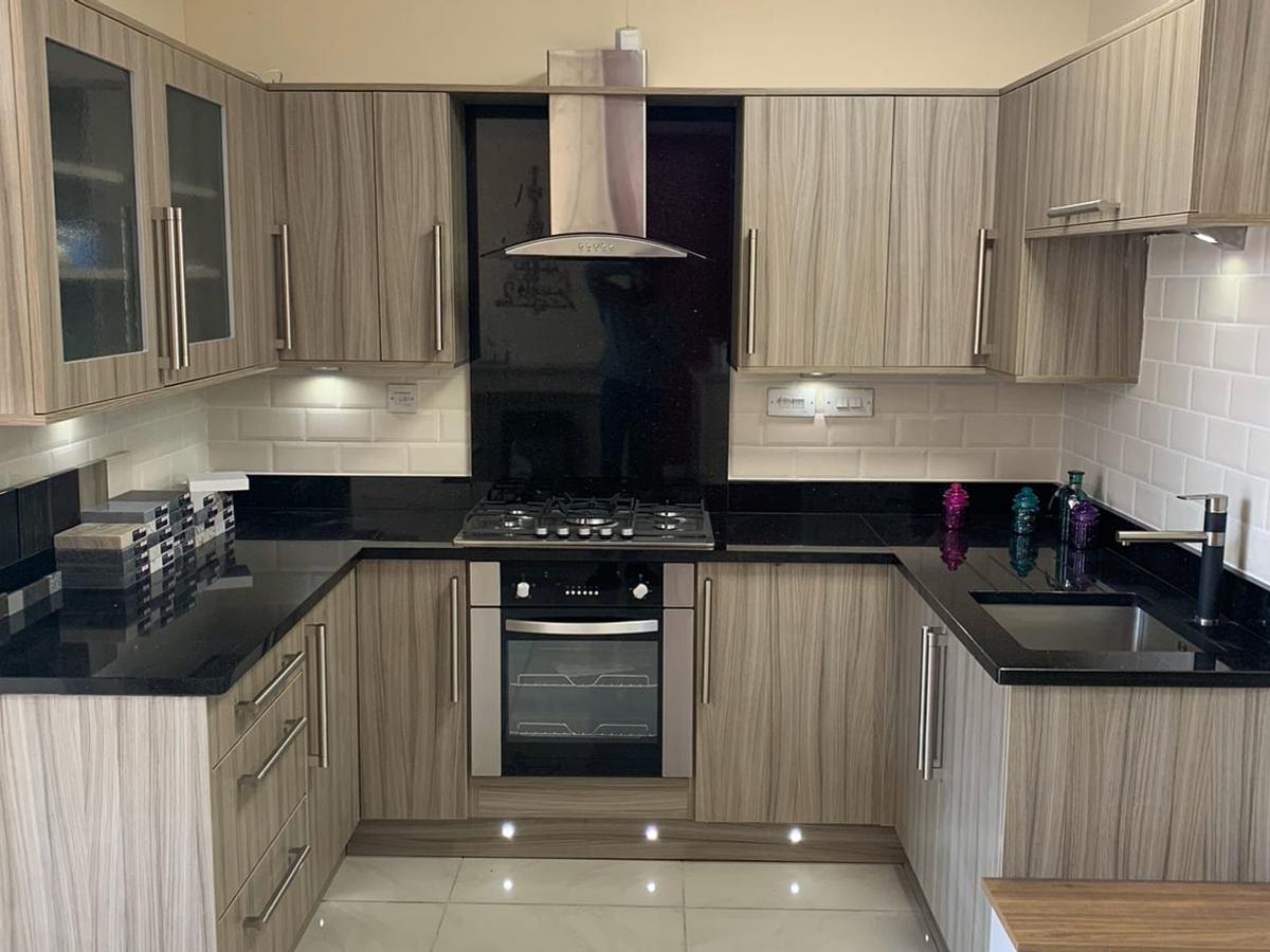 U-Shaped Kitchen with Granite Worktops & Iberna Appliances ...